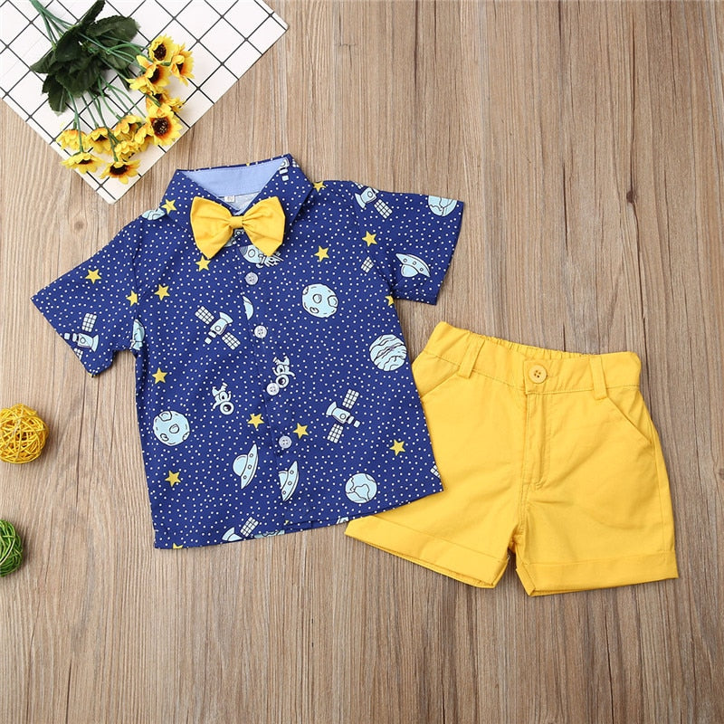 Toddler Boys 2-Piece Outfit – Space Print Shirt with Yellow Bow Tie & Shorts Set